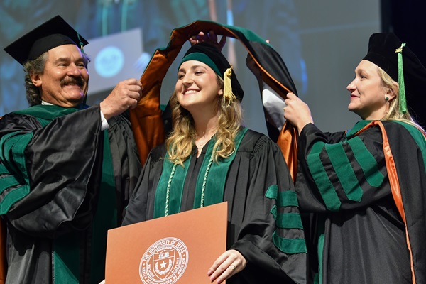 McGovern Medical School student at commencement