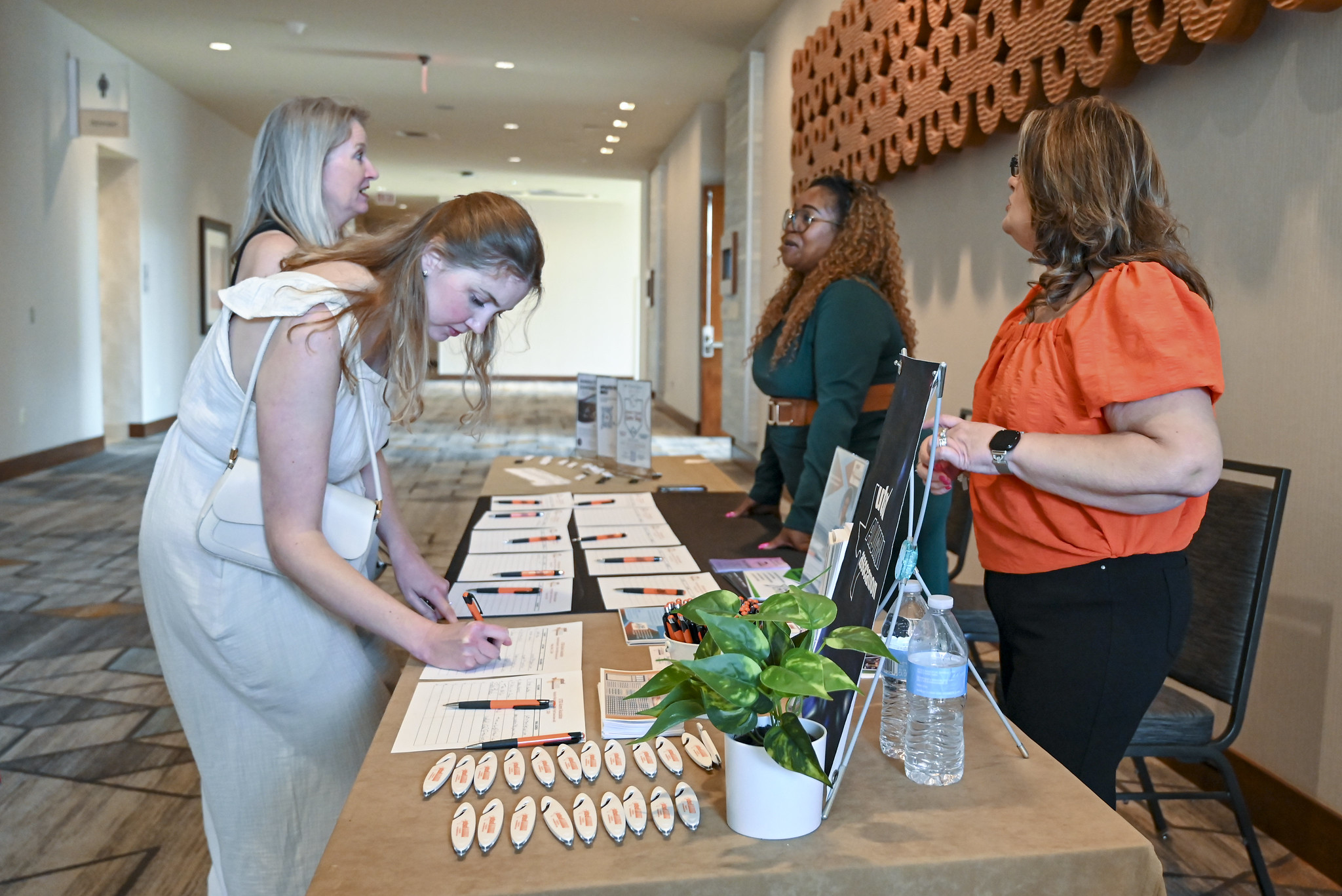 Student checking in at volunteer event