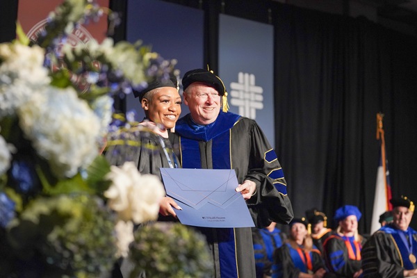 School of Public Health student and Dean at commencement