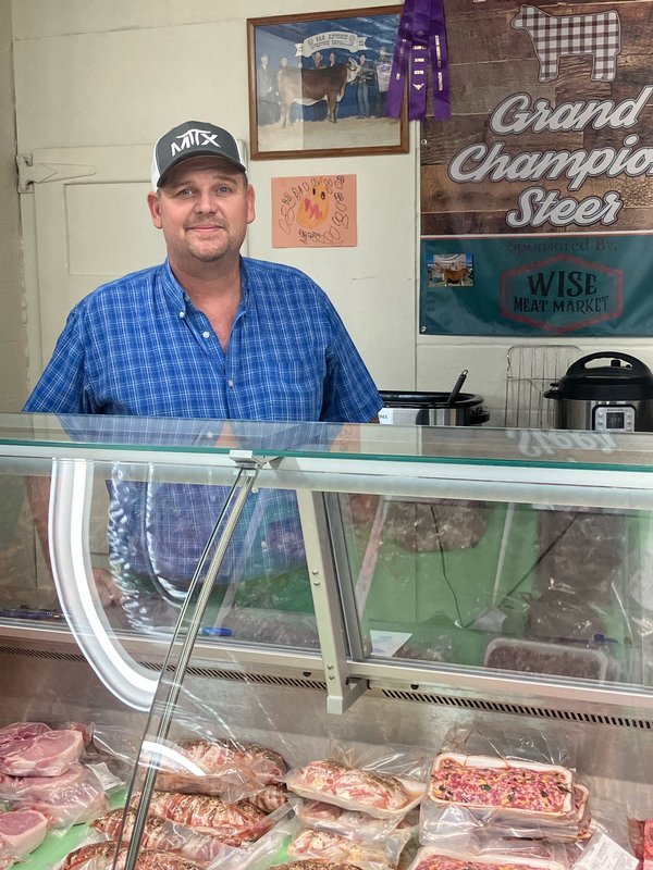 Mark Wise stands proudly in his family-owned business, Wise Meat Market. (Photo provided by Wise family)