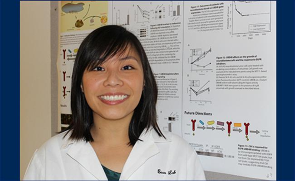 Sirisaengtaksin shown by a poster during her PhD studies at the Graduate School