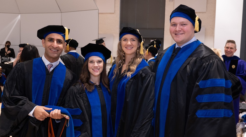 Four MD Anderson UTHealth Houston Graduate School students at commencement