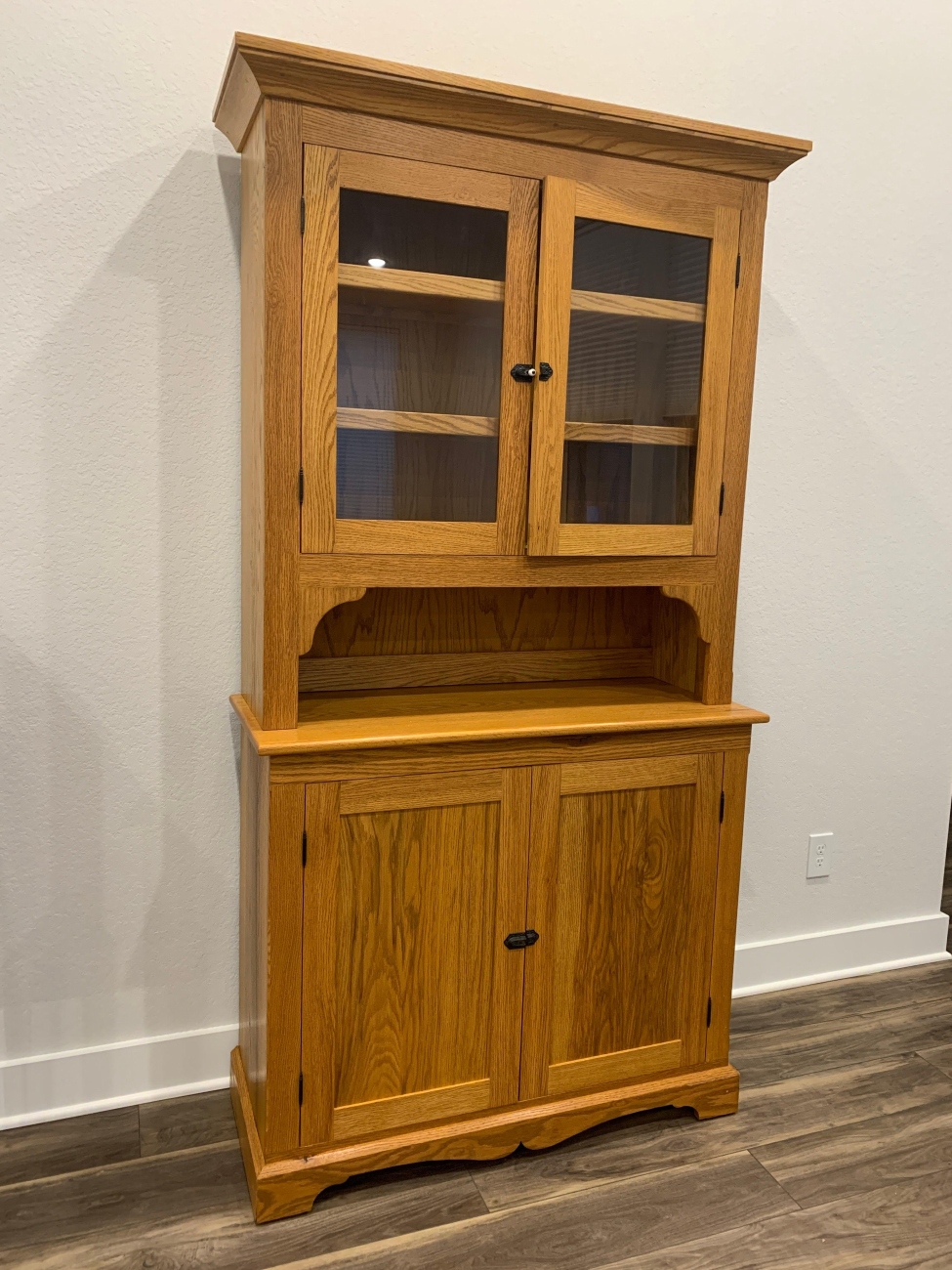 A wooden cabinet Myron built by hand