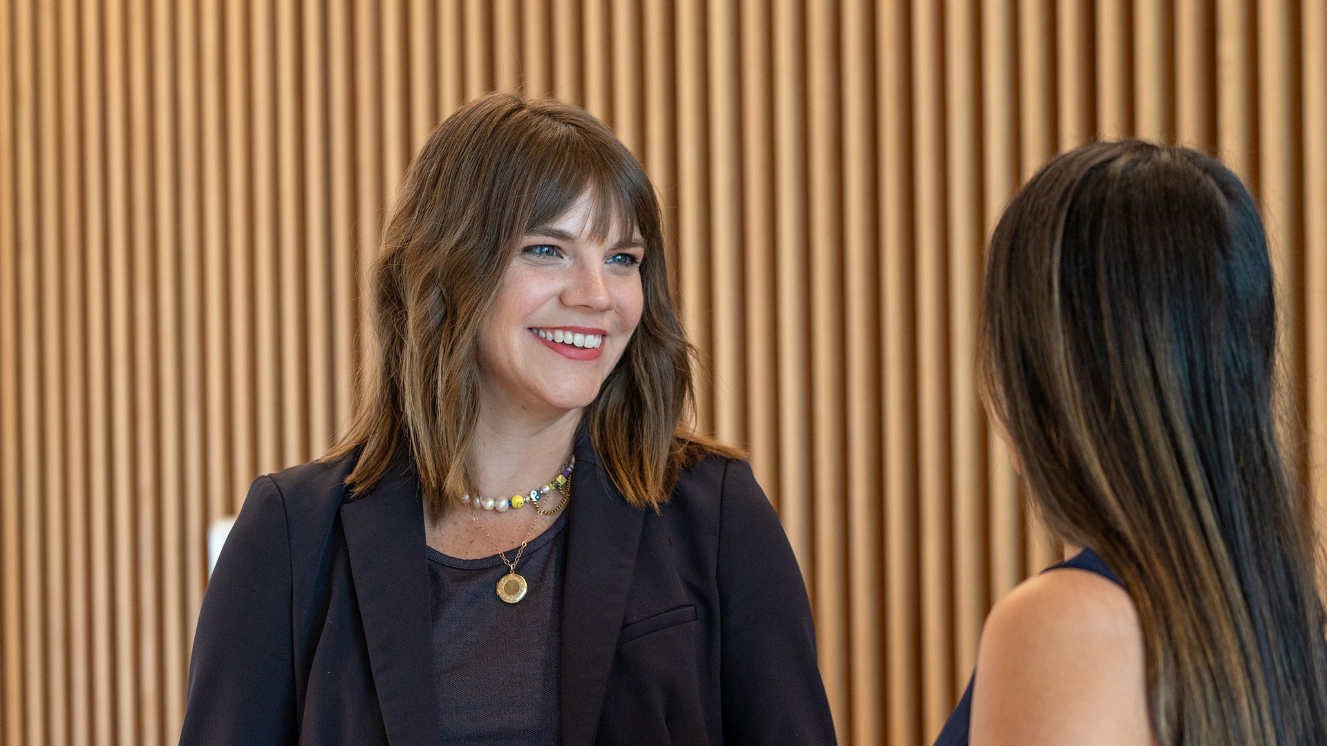 Three women talking on Women in Leadership Panel